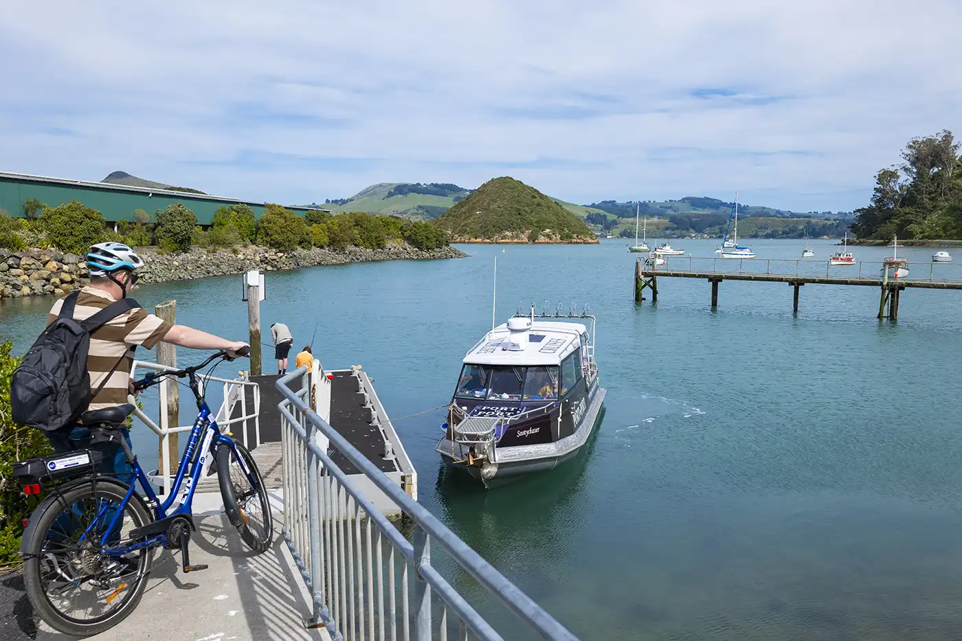 Cyclist waiting for the Water taxi