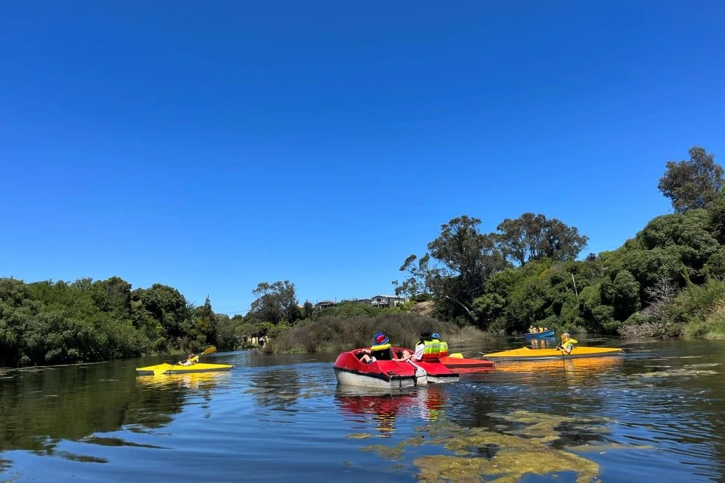 Pedal boats and kayaks on the creek.