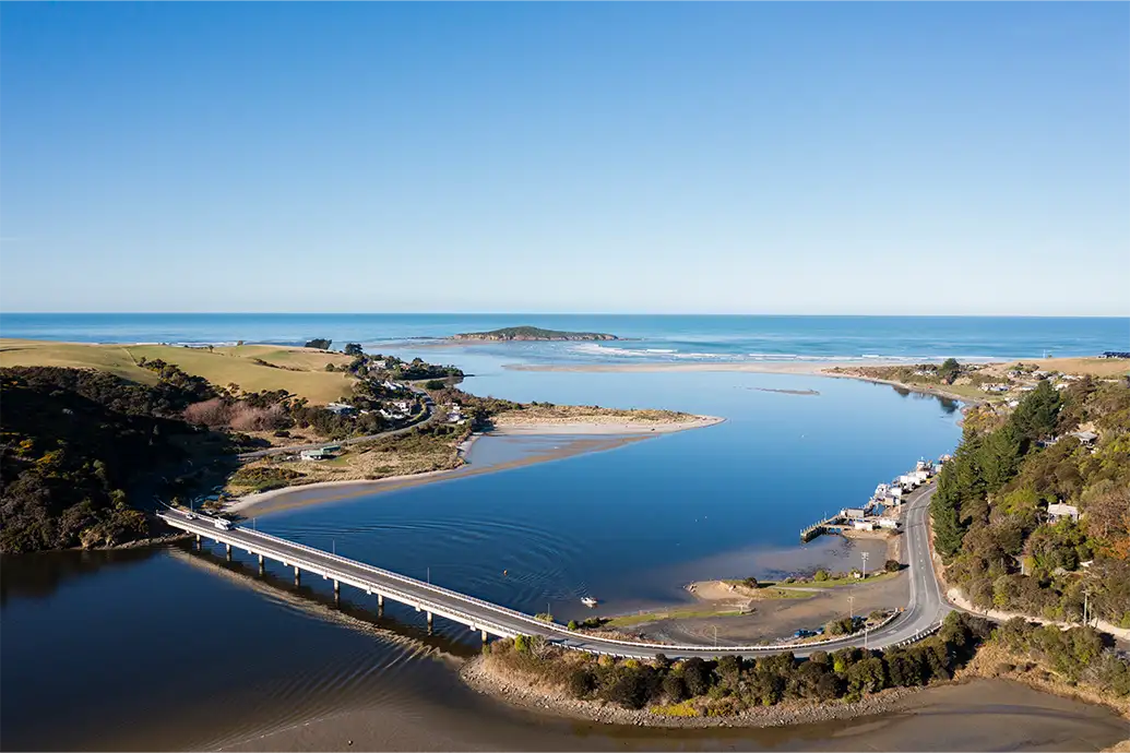 Best of Brighton 6 An aerial view of Taieri Mouth and the road bridge which spans the water.