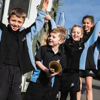 Children ringing bells